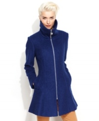 A flared silhouette and an edgy exposed zipper contrast so well with the traditional bouclé fabric of GUESS' chic coat! A flared silhouette and an edgy exposed zipper contrast so well with the traditional bouclé fabric of GUESS' chic coat!
