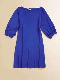 Puffed, three-quarter sleeves and a standout back zipper make this not-so-basic frock uniquely adorable.ScoopneckThree-quarter puff sleevesBack zipperRayonMachine washImported Puffed, three-quarter sleeves and a standout back zipper make this not-so-basic frock uniquely adorable.ScoopneckThree-quarter puff sleevesBack zipperRayonMachine washImported