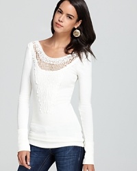 When the urge to add a little bohemian flair to your outfit hits, look no further than Free People. This comfortable thermal knit features a crochet panel on the front that creates a sheer detail right below the collar. Pair it with skinny jeans and ankle boots for a no-fail fall look! When the urge to add a little bohemian flair to your outfit hits, look no further than Free People. This comfortable thermal knit features a crochet panel on the front that creates a sheer detail right below the collar. Pair it with skinny jeans and ankle boots for a no-fail fall look!