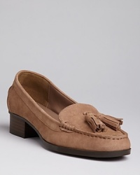 These luxe Lauren Ralph Lauren loafers feature moc stitching and stylish tassels, perfect for your workdays and weekends. These luxe Lauren Ralph Lauren loafers feature moc stitching and stylish tassels, perfect for your workdays and weekends.