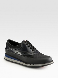 A classic lace-up, finely crafted in smooth leather with mesh detail for a sporty finish.Leather upperLeather liningPadded insoleRubber soleMade in ItalyThis style runs true to size. We recommend ordering your usual size for a standard fit. A classic lace-up, finely crafted in smooth leather with mesh detail for a sporty finish.Leather upperLeather liningPadded insoleRubber soleMade in ItalyThis style runs true to size. We recommend ordering your usual size for a standard fit.