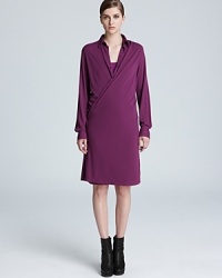 The Jean Paul Gaultier wrap dress--menswear-inspired style with downtown sensibility. Smart for the office, sharp for off-hours and stellar with moto boots. The Jean Paul Gaultier wrap dress--menswear-inspired style with downtown sensibility. Smart for the office, sharp for off-hours and stellar with moto boots.