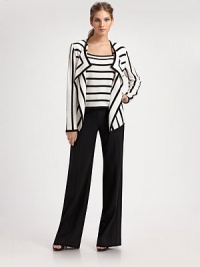 A must-have, wardrobe staple in a timeless wide leg design.Banded waist Zip fly Wide leg Inseam, about 36 63% triacetate/37% polyester Dry clean Made in USA Additional Information St. John General Size Guide A must-have, wardrobe staple in a timeless wide leg design.Banded waist Zip fly Wide leg Inseam, about 36 63% triacetate/37% polyester Dry clean Made in USA Additional Information St. John General Size Guide
