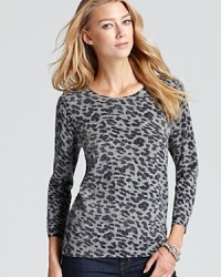 Embrace your animal instincts with this soft knit Joie sweater that flaunts a timeless leopard print trend in a very soft, cashmere-kissed wool blend. Embrace your animal instincts with this soft knit Joie sweater that flaunts a timeless leopard print trend in a very soft, cashmere-kissed wool blend.