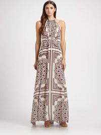 This floor-length silk silhouette is patterned with a chic, on-trend paisley print.Halter necklinePeplum detailBack keyhole with tie closureConcealed back zipAbout 25 from natural waistSilkDry cleanMade in Italy of imported fabricModel shown is 5'11 (180cm) wearing US size 4. This floor-length silk silhouette is patterned with a chic, on-trend paisley print.Halter necklinePeplum detailBack keyhole with tie closureConcealed back zipAbout 25 from natural waistSilkDry cleanMade in Italy of imported fabricModel shown is 5'11 (180cm) wearing US size 4.