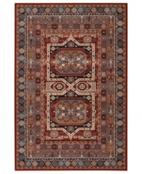 A variety of intricate symmetrical patterns in a bold red and dark blue colorway create a captivating focal point for any space in this area rug from Couristan. Crafted of pure New Zealand wool for long-lasting strength and beauty. A variety of intricate symmetrical patterns in a bold red and dark blue colorway create a captivating focal point for any space in this area rug from Couristan. Crafted of pure New Zealand wool for long-lasting strength and beauty.