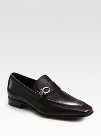 Polished slip-on style rendered in smooth Italian calfskin, finished with signature ornament at one side.Calfskin upperLeather liningPadded insoleLeather soleMade in Italy Polished slip-on style rendered in smooth Italian calfskin, finished with signature ornament at one side.Calfskin upperLeather liningPadded insoleLeather soleMade in Italy