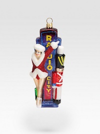 Illustrating the centuries-old Polish tradition of masterful glass blowing, New York's Radio City Music Hall marquee, complete with a sparkling Rockette and toy soldier, have been lovingly mouth-blown, hand-silvered and hand-lacquered by one of Poland's most esteemed glassmaking families. About 6H X 2W X 1D Imported Illustrating the centuries-old Polish tradition of masterful glass blowing, New York's Radio City Music Hall marquee, complete with a sparkling Rockette and toy soldier, have been lovingly mouth-blown, hand-silvered and hand-lacquered by one of Poland's most esteemed glassmaking families. About 6H X 2W X 1D Imported