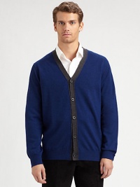A smart, preppy layer in soft merino wool with an easy button front and striking contrast border.V-neckButton frontLong sleevesMerino woolHand washImported A smart, preppy layer in soft merino wool with an easy button front and striking contrast border.V-neckButton frontLong sleevesMerino woolHand washImported