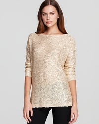 Dripping with dazzling sequins, this effortless DKNYC sweater presents your everyday style a wealth of golden opportunities. Dripping with dazzling sequins, this effortless DKNYC sweater presents your everyday style a wealth of golden opportunities.