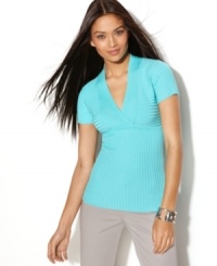INC's petite sweater has got the versatility of a tee (pair with pants, skirts and shorts to your heart's content) but with sharper style thanks to contrasting ribbing and a sleek fabrication. INC's petite sweater has got the versatility of a tee (pair with pants, skirts and shorts to your heart's content) but with sharper style thanks to contrasting ribbing and a sleek fabrication.