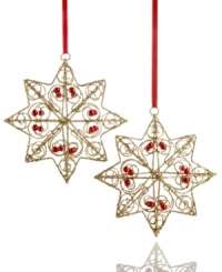 Reach for the stars. An intricate wire frame coated with gold glitter is shaped into a shimmering star ornament for a stunning piece to trim the tree. Reach for the stars. An intricate wire frame coated with gold glitter is shaped into a shimmering star ornament for a stunning piece to trim the tree.