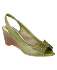 The Naturalizer Bernice Pumps feature a slashed and studded bow embellishment on a classic slingback wedge for a new take on an old favorite. The Naturalizer Bernice Pumps feature a slashed and studded bow embellishment on a classic slingback wedge for a new take on an old favorite.