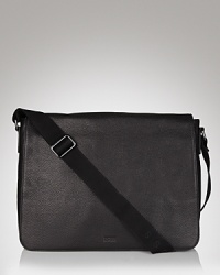 Leather messenger bag with adjustable grosgrain strap, BOSS insignia embossed on front. Miscellaneous slot inside, interior zip pockets. Fully lined. Leather messenger bag with adjustable grosgrain strap, BOSS insignia embossed on front. Miscellaneous slot inside, interior zip pockets. Fully lined.