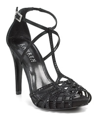 Scores of dazzling rhinestones rest atop sleek satin on Lauren Ralph Lauren's Kaden sandals, sure to make an unforgettable entrance. Scores of dazzling rhinestones rest atop sleek satin on Lauren Ralph Lauren's Kaden sandals, sure to make an unforgettable entrance.