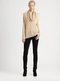 Metallic threading gives a subtle sheen to this slouchy cowlneck style crafted from fine rayon knit.CowlneckDropped shouldersRibbed trimPullover styleAbout 25 from shoulder to hem75% rayon/16% nylon/9% metallic fibersHand washImportedModel shown is 5'11 (180cm) wearing US size Small. Metallic threading gives a subtle sheen to this slouchy cowlneck style crafted from fine rayon knit.CowlneckDropped shouldersRibbed trimPullover styleAbout 25 from shoulder to hem75% rayon/16% nylon/9% metallic fibersHand washImportedModel shown is 5'11 (180cm) wearing US size Small.