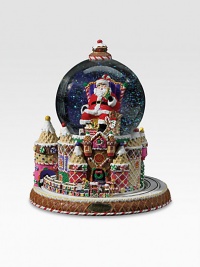 A delightful addition to your holiday decor, this cheerful design shows Santa amidst castles of sweet treats and plays the tune We Wish You A Merry Christmas.Hand-made, hand-paintedGlass and resinAbout 8W X 8H X 4.7 globe diameterMade in Poland A delightful addition to your holiday decor, this cheerful design shows Santa amidst castles of sweet treats and plays the tune We Wish You A Merry Christmas.Hand-made, hand-paintedGlass and resinAbout 8W X 8H X 4.7 globe diameterMade in Poland