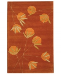 In bright shades of orange and red, this radiant area rug makes an impact in every room. The rug's unique color clarity and tonal depth is achieved by using only the purest New Zealand wool and accents of viscose for a silky soft feel. Hand-tufted in India. In bright shades of orange and red, this radiant area rug makes an impact in every room. The rug's unique color clarity and tonal depth is achieved by using only the purest New Zealand wool and accents of viscose for a silky soft feel. Hand-tufted in India.