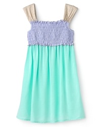 She'll love the flow and flounce of this cute ruffled dress, adorned with contrast smocking at the chest and contrast ruffle shoulder straps. She'll love the flow and flounce of this cute ruffled dress, adorned with contrast smocking at the chest and contrast ruffle shoulder straps.