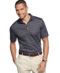 Come out swinging. Gear yourself for a great game with this striped shirt from Greg Norman that features moisture management to keep you at the top of your game. Come out swinging. Gear yourself for a great game with this striped shirt from Greg Norman that features moisture management to keep you at the top of your game.