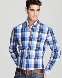 The large tonal squares of this Lacoste button-down create an eye-catching pattern that's modern, hip and easy to wear. The large tonal squares of this Lacoste button-down create an eye-catching pattern that's modern, hip and easy to wear.