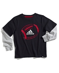 A sporty layered look for the future athlete featuring a red football and silver logo. A sporty layered look for the future athlete featuring a red football and silver logo.