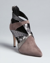 Mixed-media uppers define these cage-style pointed toe Alejandro Ingelmo booties that are ready for a workday or a night out, year-round. Mixed-media uppers define these cage-style pointed toe Alejandro Ingelmo booties that are ready for a workday or a night out, year-round.