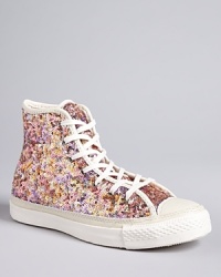 Like a private party for your feet, these sequin-encrusted Converse sneakers add lighthearted charm to casual days. Like a private party for your feet, these sequin-encrusted Converse sneakers add lighthearted charm to casual days.