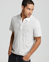 In this casual cool striped polo, rendered in soft, slubby cotton for a textured feel, you'll strike a handsome pose no matter where you go. In this casual cool striped polo, rendered in soft, slubby cotton for a textured feel, you'll strike a handsome pose no matter where you go.