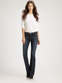 Complement your form in these dark-wash jeans with flare-leg construction and signature stitching. THE FITMedium rise, about 7½Inseam, about 35THE DETAILSZip flyFive-pocket style88% cotton/10% polyester/2% spandexMachine washMade in USA of imported fabricModel shown is 5'11 (178cm) wearing US size 4. Complement your form in these dark-wash jeans with flare-leg construction and signature stitching. THE FITMedium rise, about 7½Inseam, about 35THE DETAILSZip flyFive-pocket style88% cotton/10% polyester/2% spandexMachine washMade in USA of imported fabricModel shown is 5'11 (178cm) wearing US size 4.