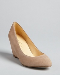 With gracefully curved vamps, polished almond toes and streamlined wedge heels, these IVANKA TRUMP pumps simply work-9-to-5 or after hours. With gracefully curved vamps, polished almond toes and streamlined wedge heels, these IVANKA TRUMP pumps simply work-9-to-5 or after hours.