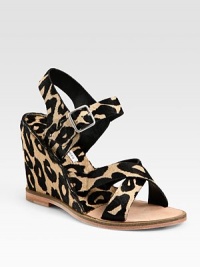 Chic calf hair in a lavish leopard print with a considerable wedge, comfy slingback and an adjustable ankle strap. Calf hair-covered wedge, 4 (100mm)Leopard-print calf hair upperLeather and calf hair liningLeather solePadded insoleImportedOUR FIT MODEL RECOMMENDS ordering one half size up as this style runs small. Chic calf hair in a lavish leopard print with a considerable wedge, comfy slingback and an adjustable ankle strap. Calf hair-covered wedge, 4 (100mm)Leopard-print calf hair upperLeather and calf hair liningLeather solePadded insoleImportedOUR FIT MODEL RECOMMENDS ordering one half size up as this style runs small.