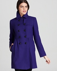 An Empire waist brings a flattering silhouette to this cozy double-breasted coat from DKNY.