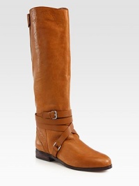 Classic pebbled leather staple with wrap-around buckle straps for on-the-go style. Stacked heel, 1 (25mm)Shaft, 15½Leg circumference, 13½Leather upperPull-on style with adjustable wrap-around buckle strapsLeather lining and solePadded insoleImported Classic pebbled leather staple with wrap-around buckle straps for on-the-go style. Stacked heel, 1 (25mm)Shaft, 15½Leg circumference, 13½Leather upperPull-on style with adjustable wrap-around buckle strapsLeather lining and solePadded insoleImported