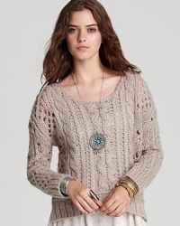 Shift into neutral with this breezy Free People sweater, classically cabled for fall, in a soft-touch wool blend. Shift into neutral with this breezy Free People sweater, classically cabled for fall, in a soft-touch wool blend.