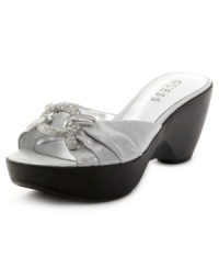Va-va-voom in a flash, by GUESS. The Radwa sandals create a party with their flirty finishes and trendy wedge heels. Va-va-voom in a flash, by GUESS. The Radwa sandals create a party with their flirty finishes and trendy wedge heels.
