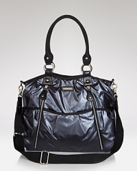 This chic, roomy satchel hides a practical secret: it's packed with on-the-go essentials for stylish mamas. By storsak.
