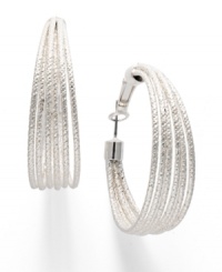 Simple hoops with star quality. Alfani's silver tone mixed metal hoops features a unique multi-row design with a textured finish. Approximate diameter: 1-1/2 inches. Simple hoops with star quality. Alfani's silver tone mixed metal hoops features a unique multi-row design with a textured finish. Approximate diameter: 1-1/2 inches.