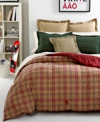 Warm red and brown tones commingle in this Kensington comforter from Lauren Ralph Lauren, featuring an allover plaid pattern for a classic look. Embellished with an embroidered Lauren Ralph Lauren monogram at the base. Reverses to solid red. Warm red and brown tones commingle in this Kensington comforter from Lauren Ralph Lauren, featuring an allover plaid pattern for a classic look. Embellished with an embroidered Lauren Ralph Lauren monogram at the base. Reverses to solid red.