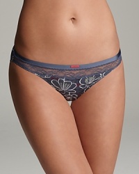 Calvin Klein Underwear's basic bikini is cut in a flattering silhouette with an all-over floral print and lace trim at the waist. Style #F3308. Calvin Klein Underwear's basic bikini is cut in a flattering silhouette with an all-over floral print and lace trim at the waist. Style #F3308.