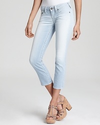 Faded railroad stripes bring vintage edge to these True Religion cropped skinny jeans. Faded railroad stripes bring vintage edge to these True Religion cropped skinny jeans.