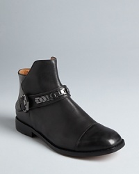 A little bit Western, a little bit moto, these Modern Vintage booties capture both trends with the brand's signature, retro styling. A little bit Western, a little bit moto, these Modern Vintage booties capture both trends with the brand's signature, retro styling.