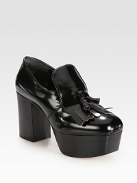 A chunky stacked platform and heel heighten this traditional oxford essential with twin tassels. Stacked heel, 3½ (90mm)Stacked platform, 1¾ (45mm)Compares to a 1¾ heel (45mm)Leather upperLeather lining and solePadded insoleMade in Italy A chunky stacked platform and heel heighten this traditional oxford essential with twin tassels. Stacked heel, 3½ (90mm)Stacked platform, 1¾ (45mm)Compares to a 1¾ heel (45mm)Leather upperLeather lining and solePadded insoleMade in Italy