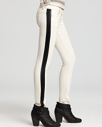 Infuse your denim archives with color blocked flair for fall--tuxedo-inspired side stripes enliven these white hot Free People skinny jeans in faux leather. Infuse your denim archives with color blocked flair for fall--tuxedo-inspired side stripes enliven these white hot Free People skinny jeans in faux leather.