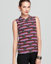 Go graphic in a silk kate spade new york blouse emboldened by a retro blocked print. Slip the style under a blazer for 9-to-5 polish, or let it shine on its own with sleek skinnies. Go graphic in a silk kate spade new york blouse emboldened by a retro blocked print. Slip the style under a blazer for 9-to-5 polish, or let it shine on its own with sleek skinnies.