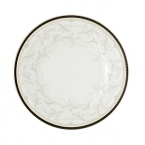 Brocade achieves an understated elegance by a combination of three design elements: a richly textured pattern of acanthus leaves; the neutral versatility of taupe; and a dramatic black band with Greek key detailing in platinum.