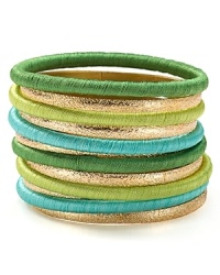 Cool girl style is all in the wrist--piled high with these boldly hued and subtly textured RJ Graziano bangles.