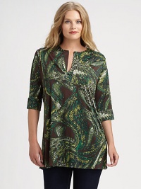 A striking print adorns this split-neck tunic. Pair this top with skinnies or slim-fitting pants. Split neckElbow-length sleevesAllover printAbout 31 from shoulder to hemVenezia/spandexDry cleanMade in USA A striking print adorns this split-neck tunic. Pair this top with skinnies or slim-fitting pants. Split neckElbow-length sleevesAllover printAbout 31 from shoulder to hemVenezia/spandexDry cleanMade in USA