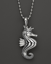 A playful sea creature dangles from a sterling silver ball chain on this everyday necklace from Lagos. A playful sea creature dangles from a sterling silver ball chain on this everyday necklace from Lagos.
