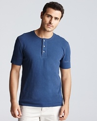 A great layering piece and a stylish alternative to the tee, the short sleeve henley is finished with a three button placket. A great layering piece and a stylish alternative to the tee, the short sleeve henley is finished with a three button placket.